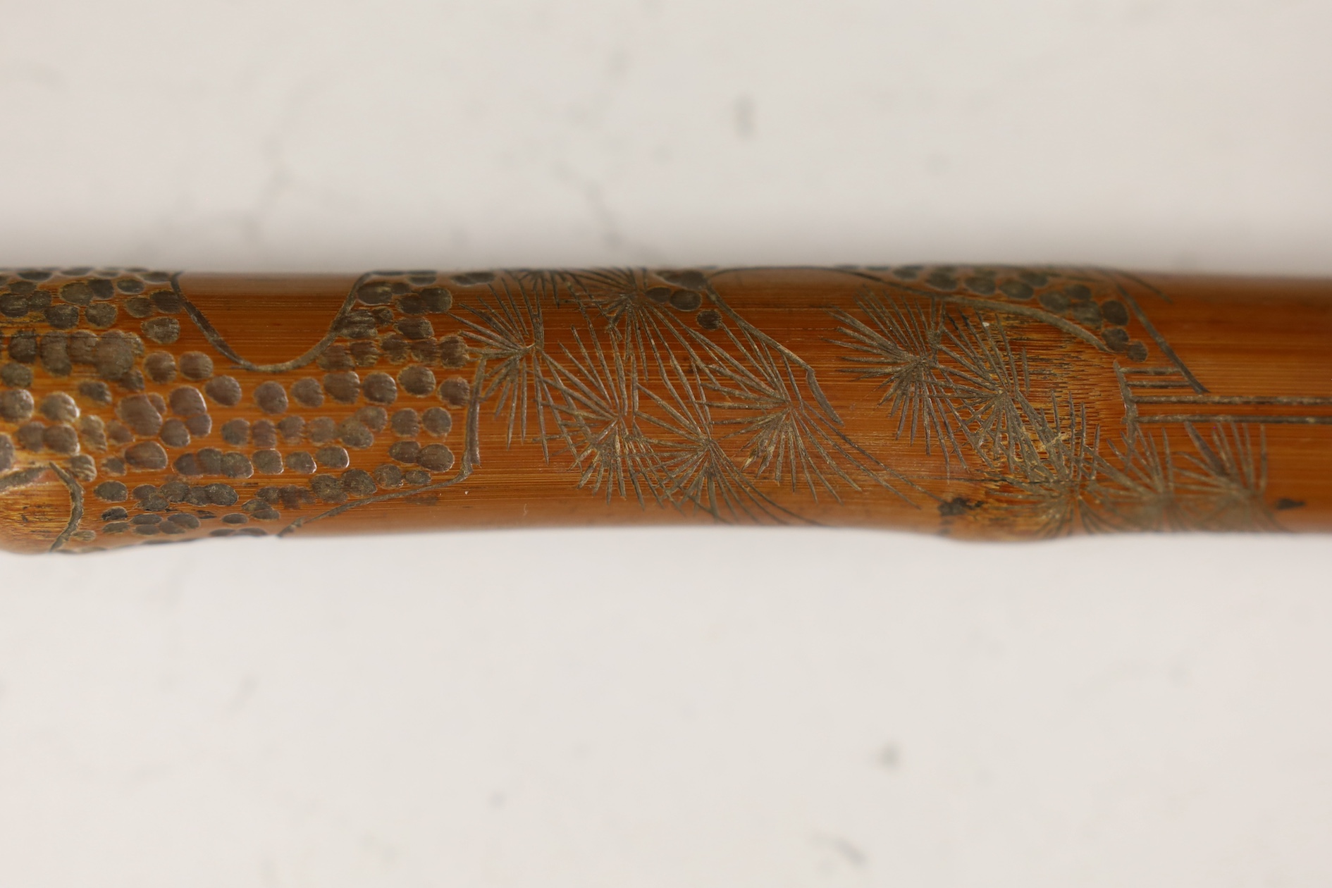 A Japanese carved and signed walking cane, 87cm high. Condition - fair to good